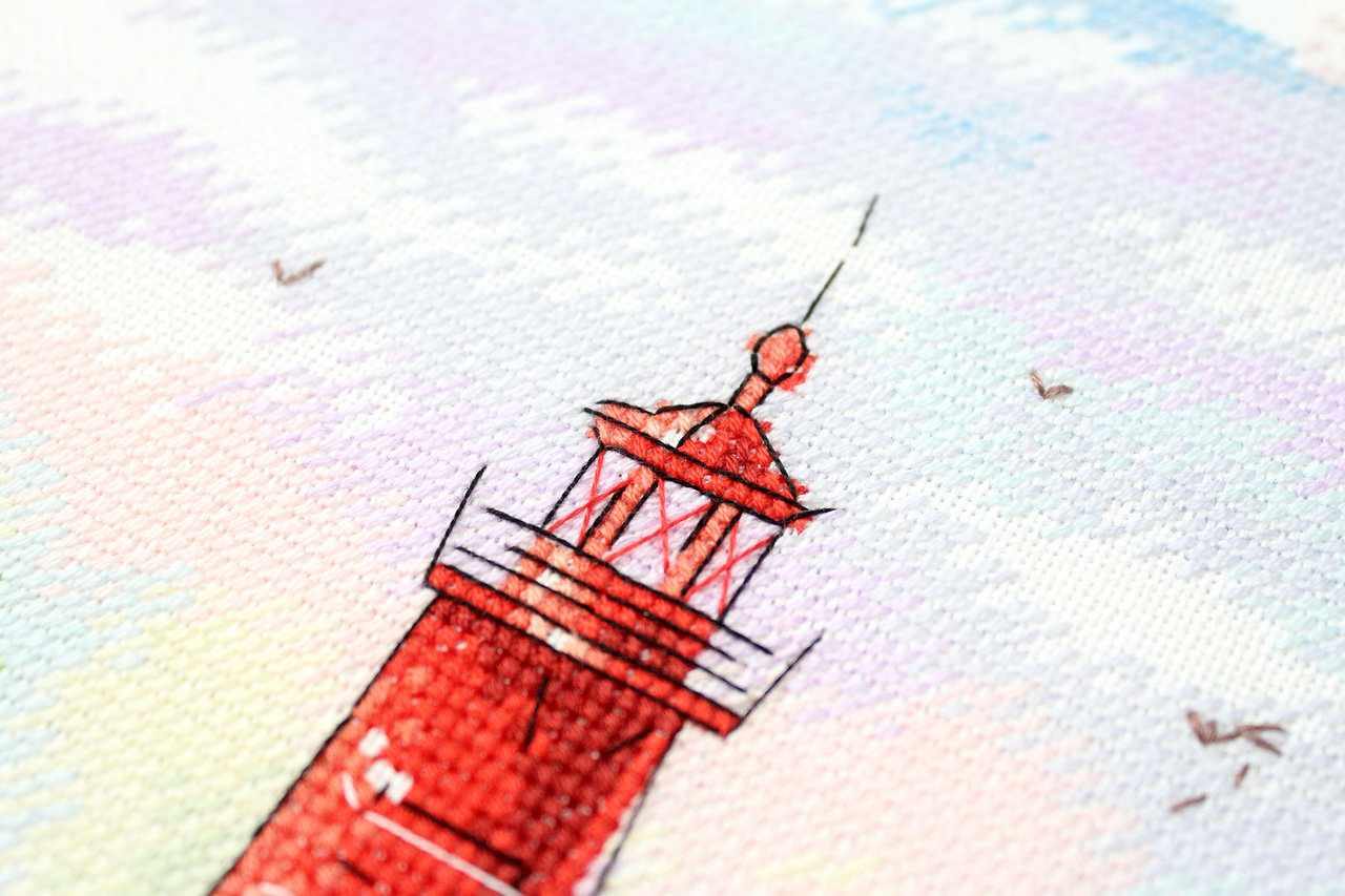 Sea Harbour SA-005 Cross-stitch kit featuring a vibrant marine landscape with a lighthouse, ocean, and violet sky.